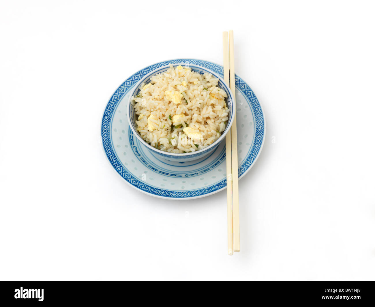 Bowl of Egg Fried Rice with Chop Sticks Stock Photo