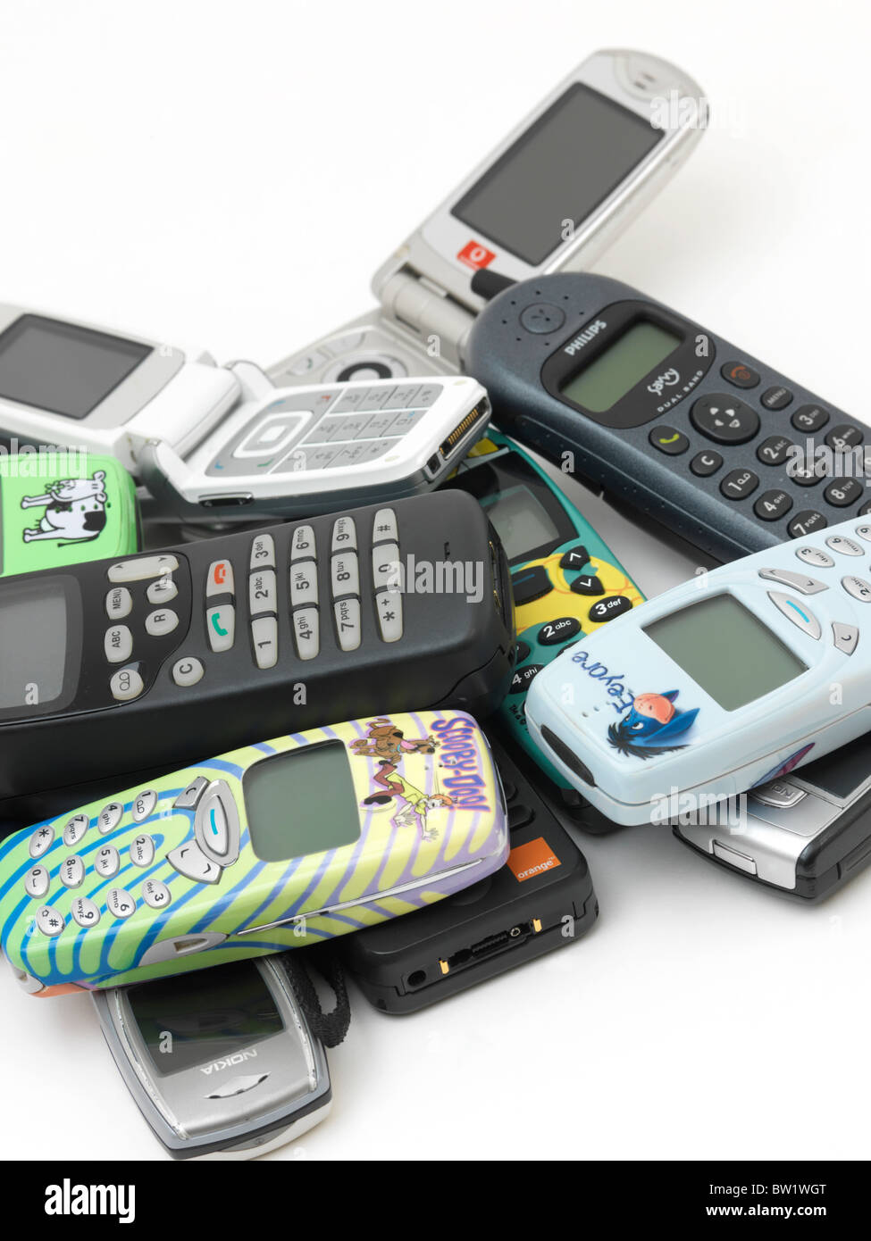 Pile Of Old Mobile Phones Nokia, Samsung, LG, Motorola And Phillips Stock Photo