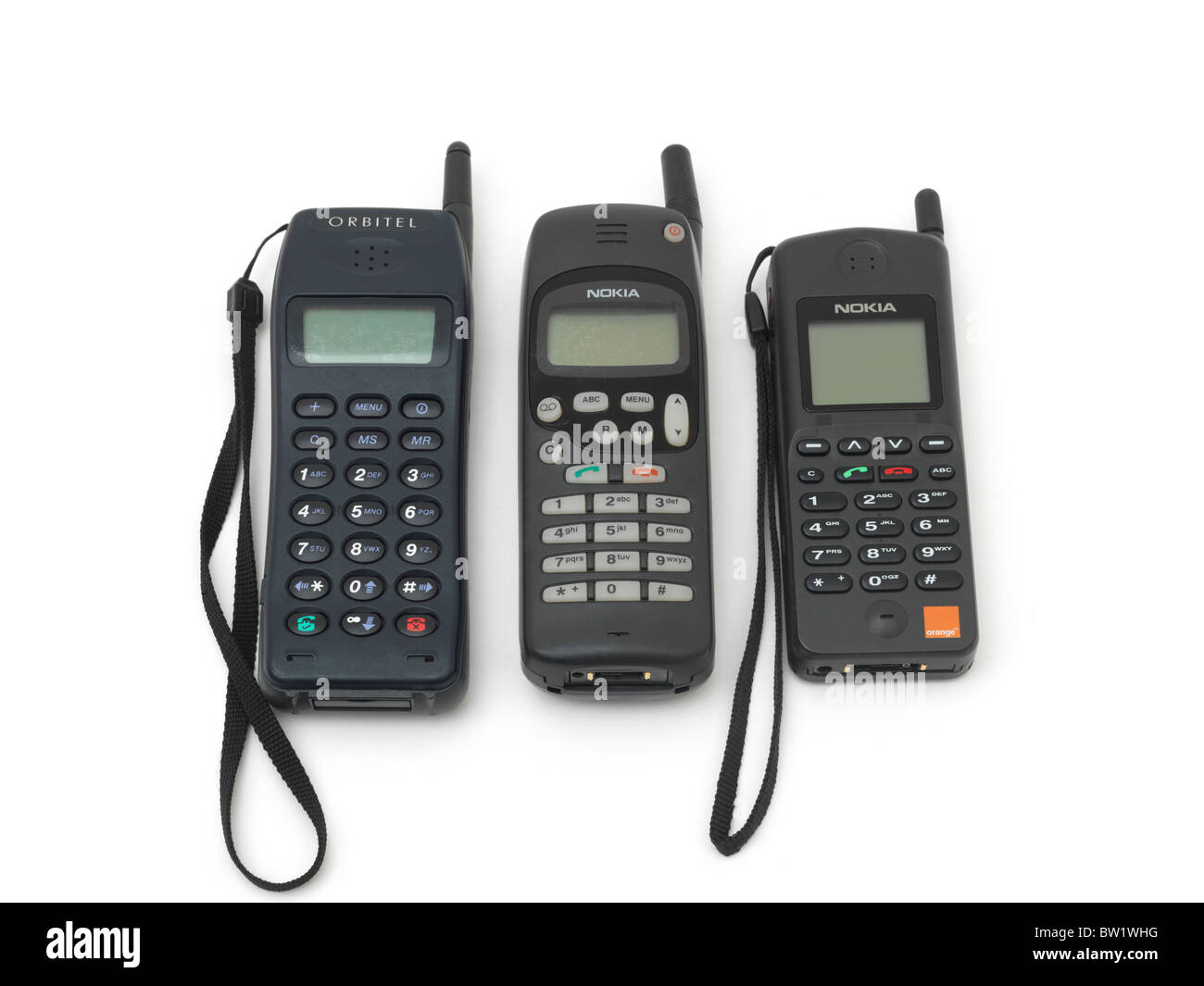 Three Old Mobile Phones Orbitel And Nokia Stock Photo