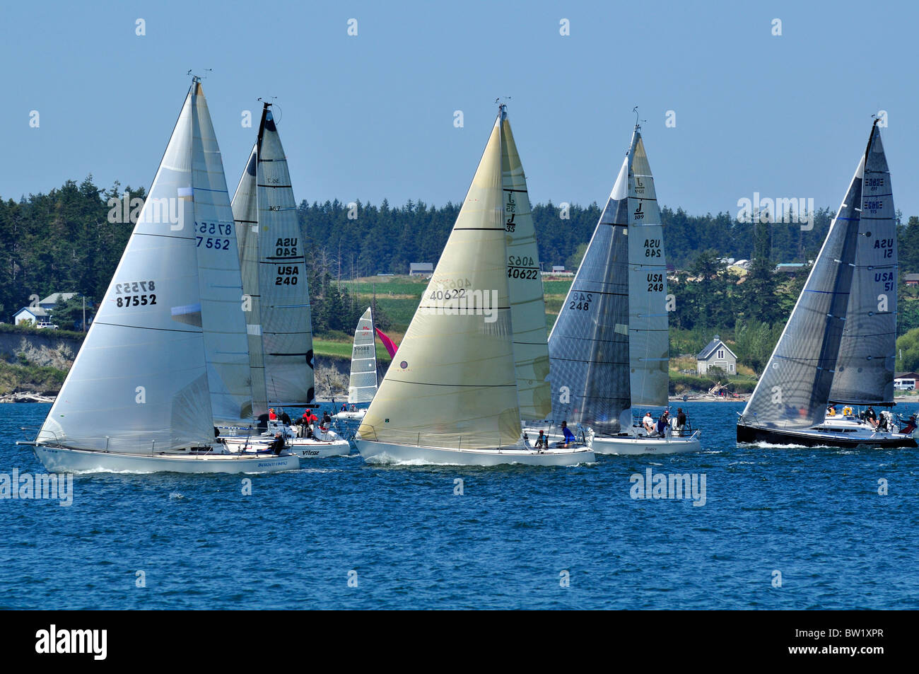 Sailboat racing off Whidbey island, Puget sound Washington. Stock Photo