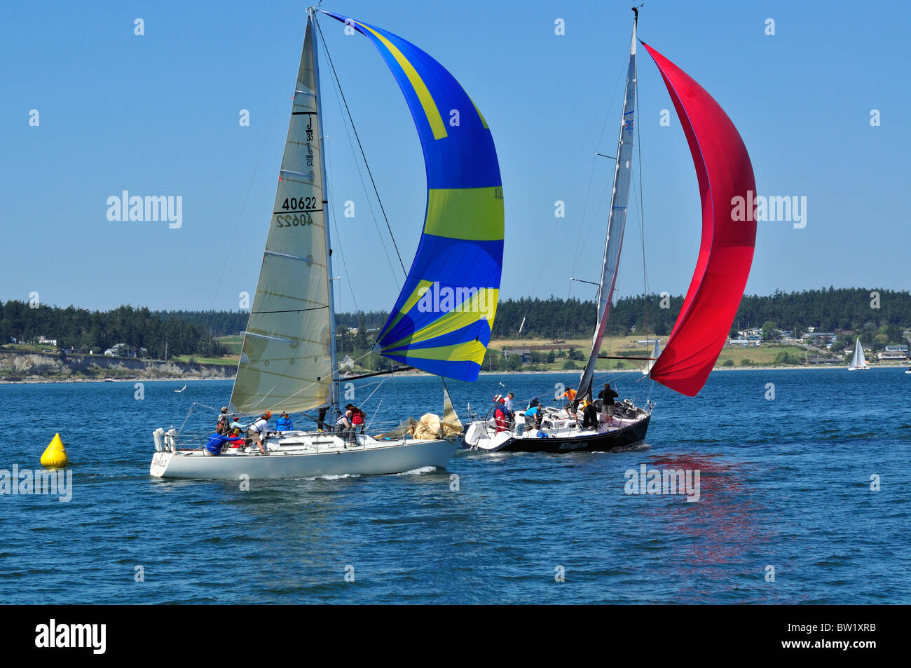 Sailboat racing off Whidbey island, Puget sound Washington. Stock Photo