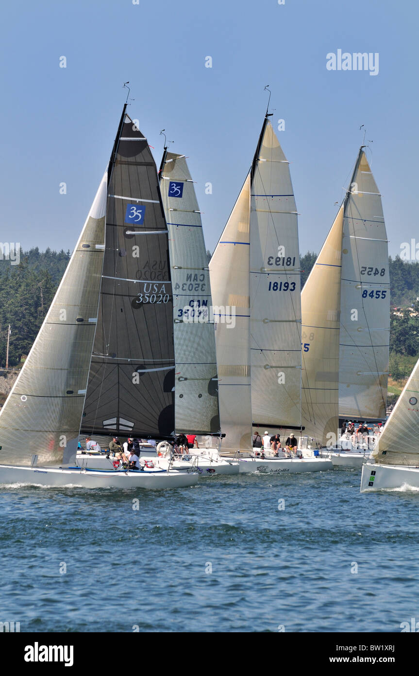 Sailboat racing off Whidbey island, Puget sound Washington. Stock Photo