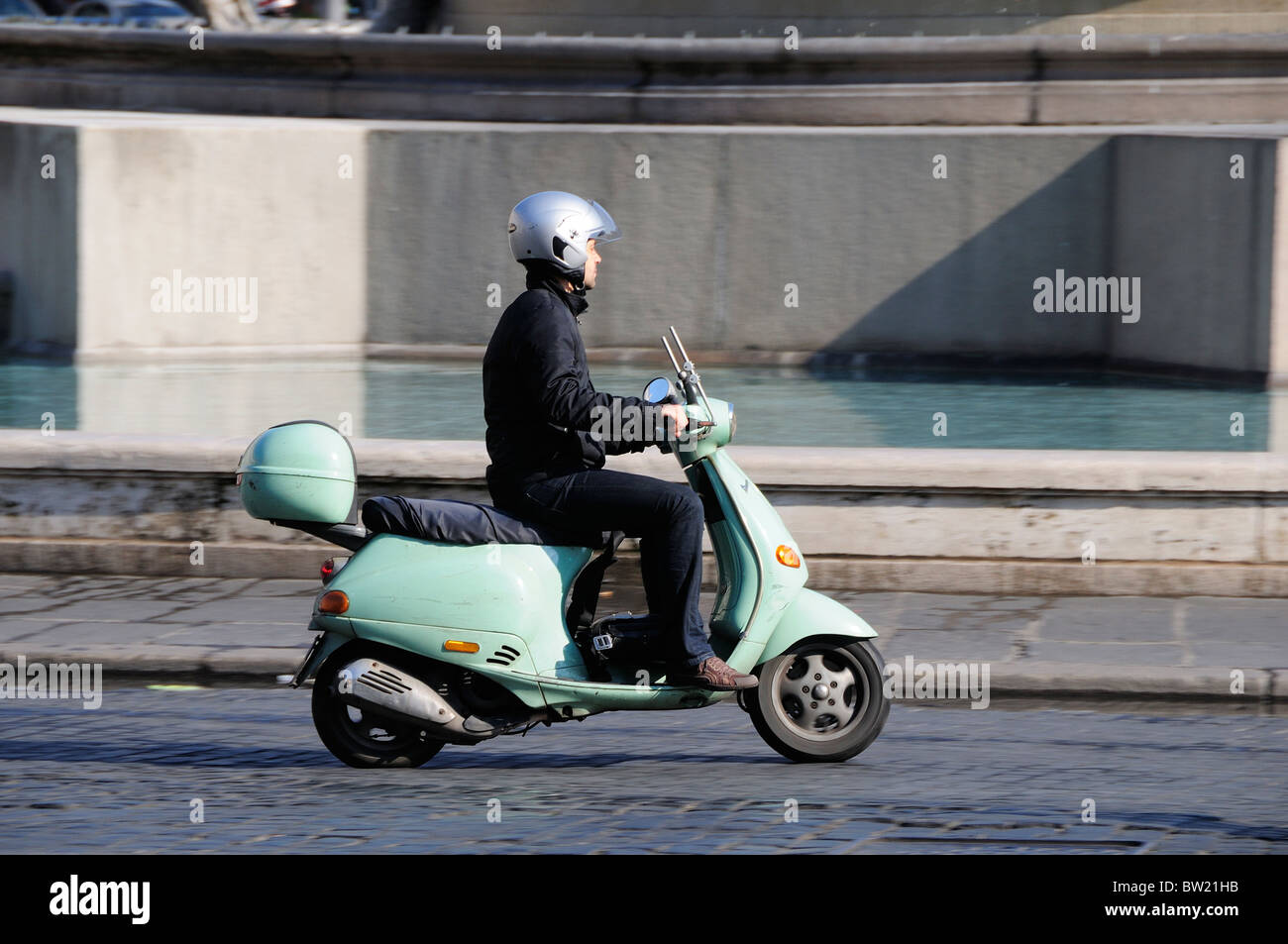 Scootering around Rome Stock Photo