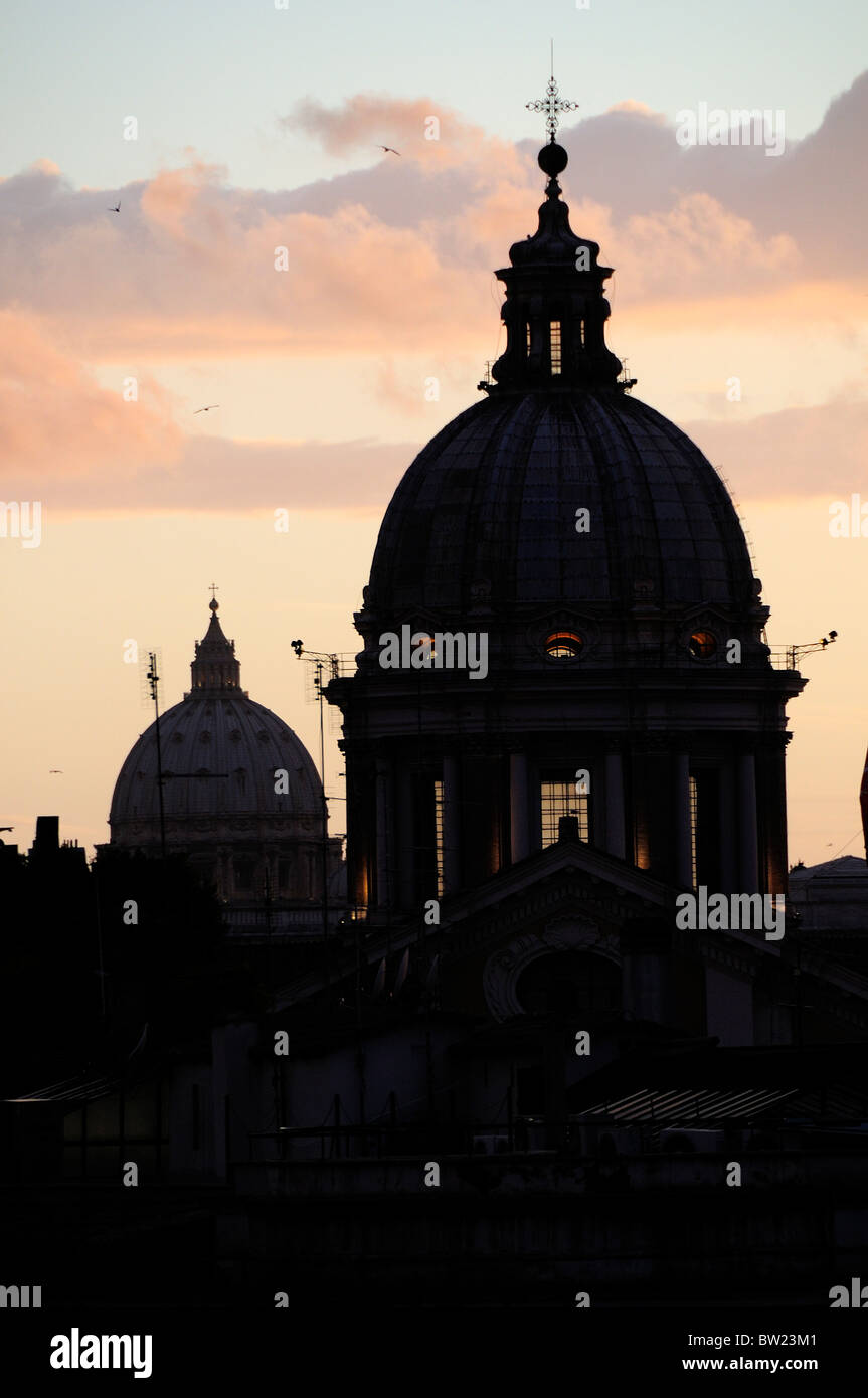 Silhouette of San Carlo al Corso church at sunset, View from Spanish Steps Stock Photo