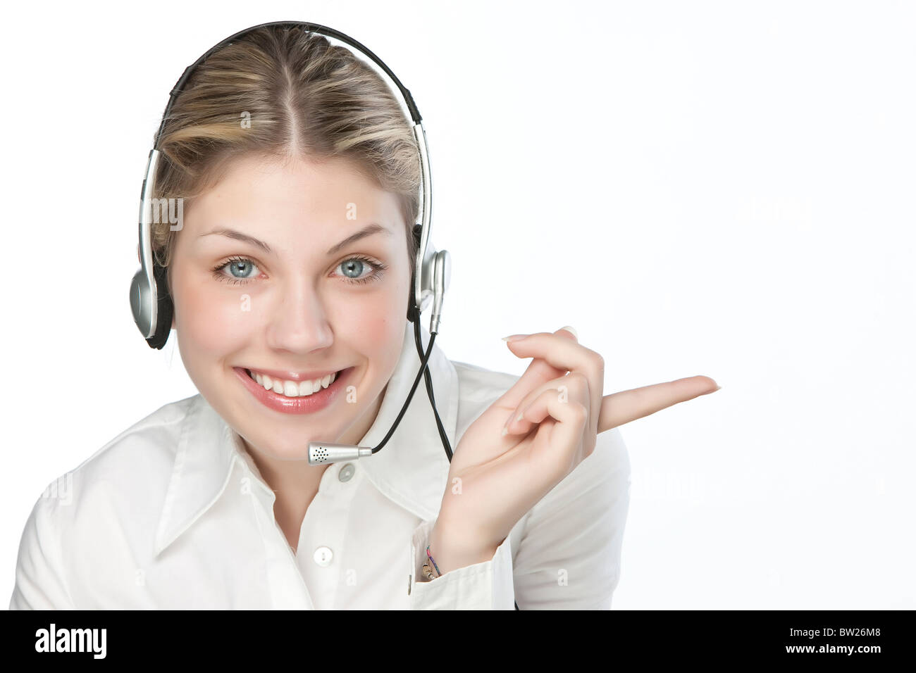 A friendly secretary/telephone operator in an office environment Stock