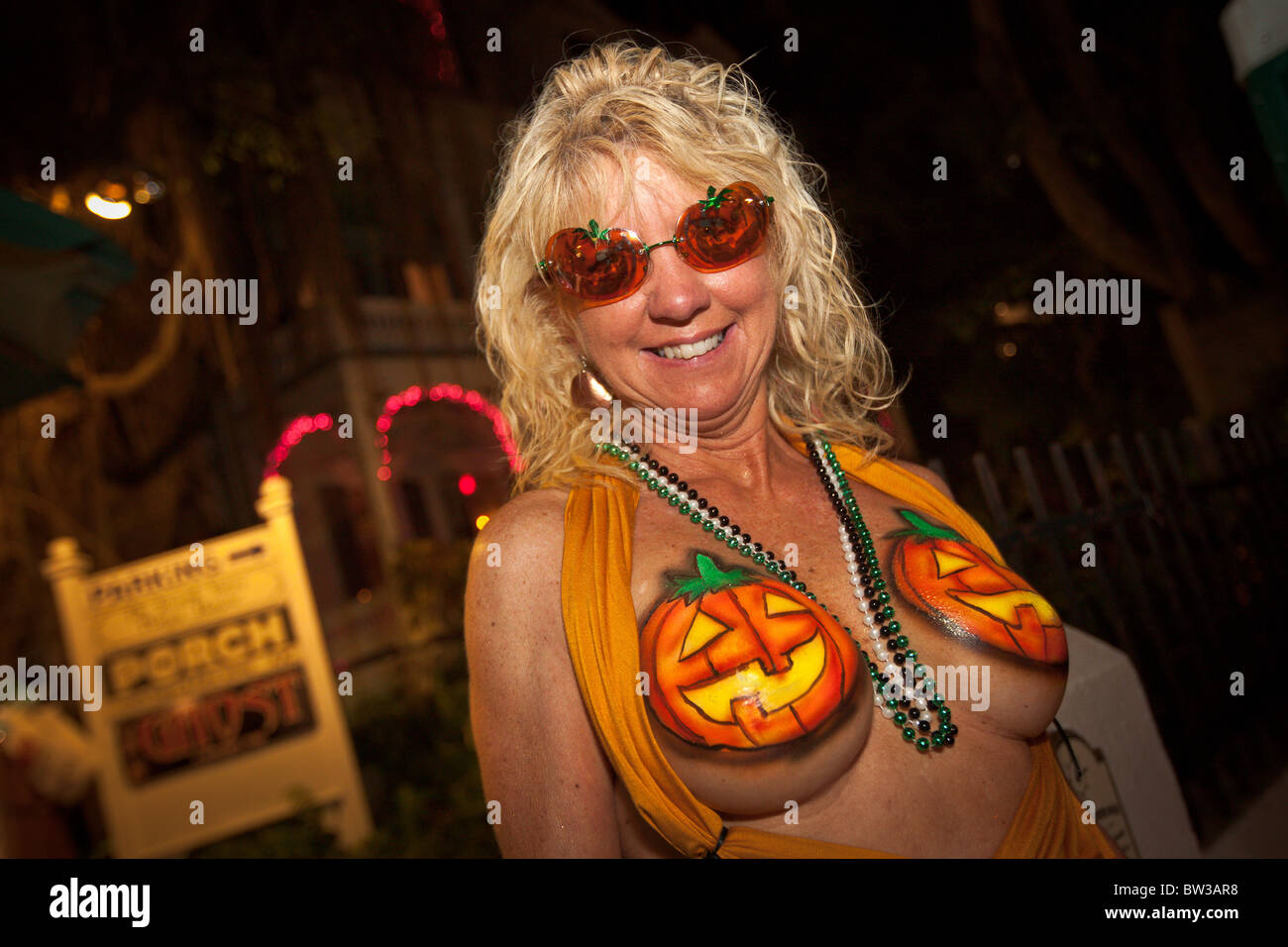 A topless reveler in only body paint during Fantasy Fest halloween parade  in Key West, Florida Stock Photo - Alamy