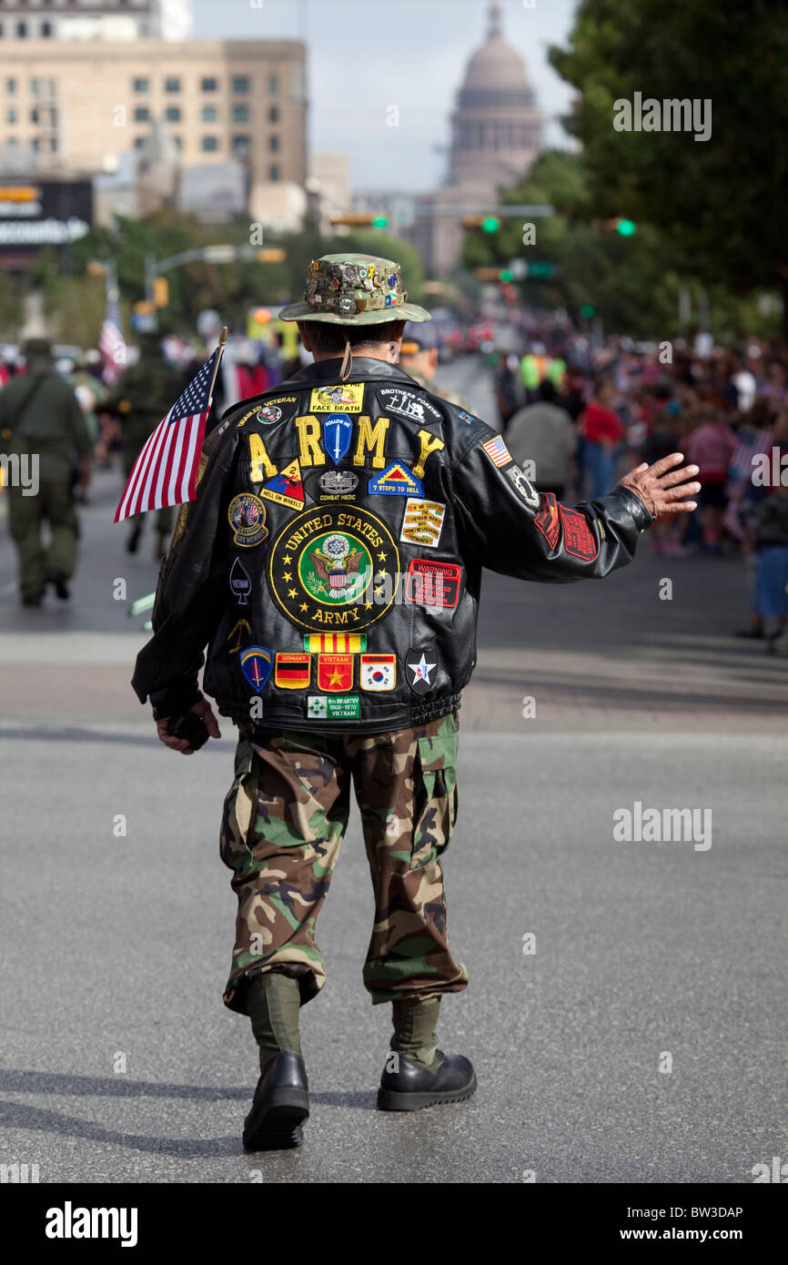 US Army Veteran marches in annual parade up Congress Avenue toward the Texas State Capitol in Austin Stock Photo