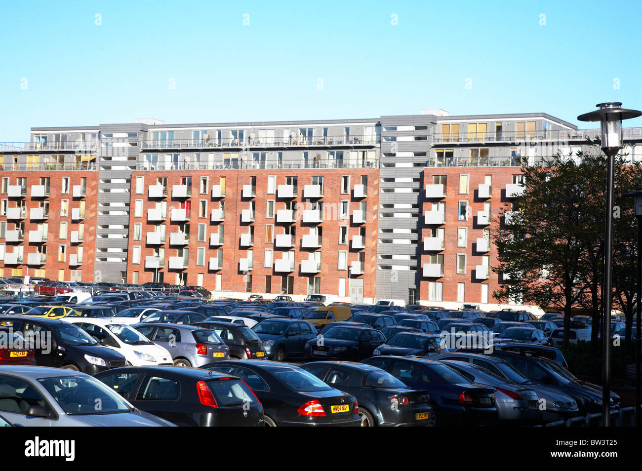 Modern living with lots of cars in Manchester UK Stock Photo Alamy