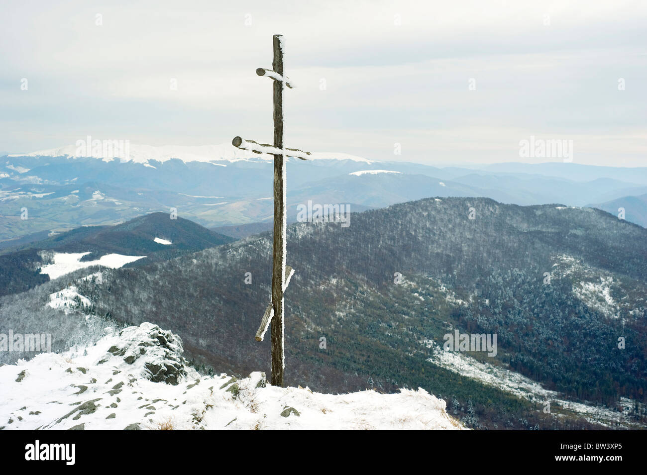 Cross on top of the Carpathian mountain Pikuy. Ukraine Stock Photo