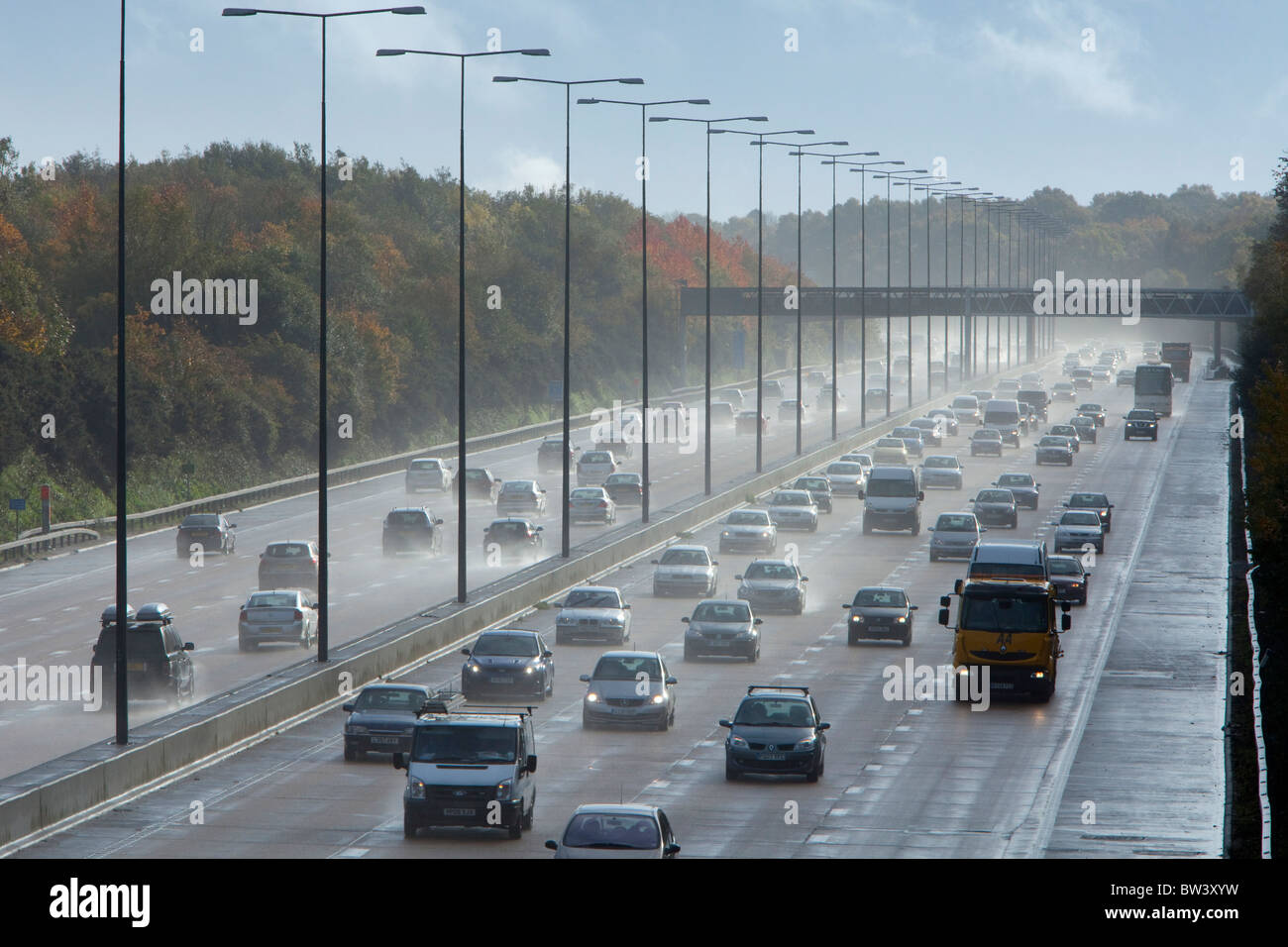 Motorway traffic in heavy spray M25 Stock Photo