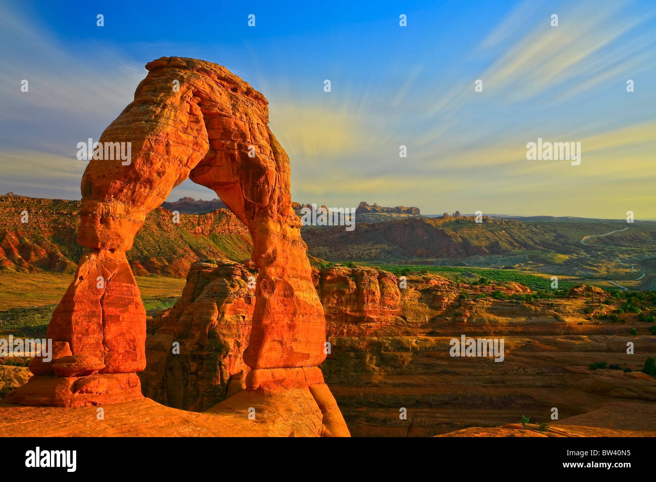 Whispy clouds over Delicate Arch, Arches National Park, Moab, Utah Stock Photo