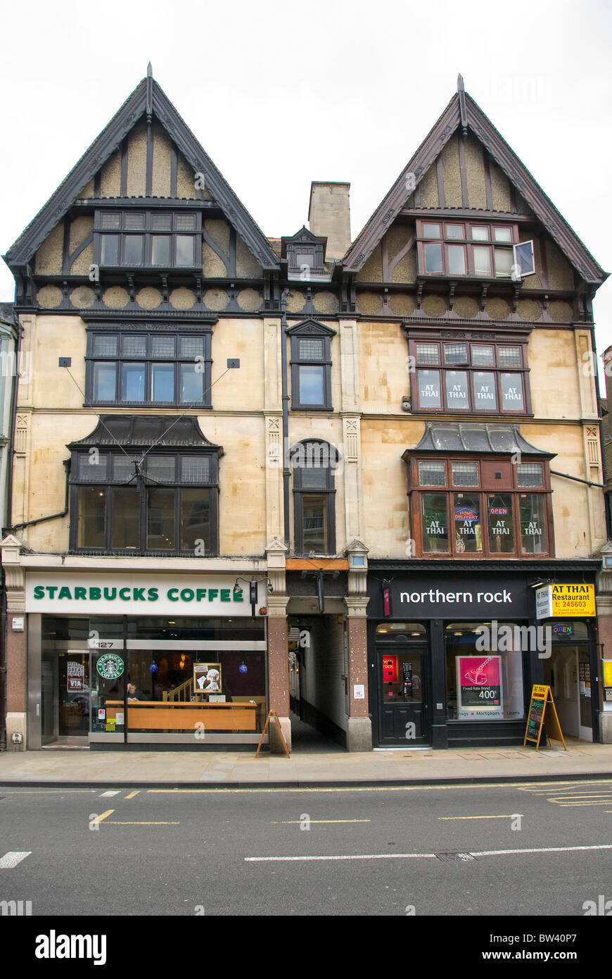 Starbucks coffee shop and Northern Rock Bank situated in historic houses, High Street, Oxford, Oxfordshire, England, UK Stock Photo