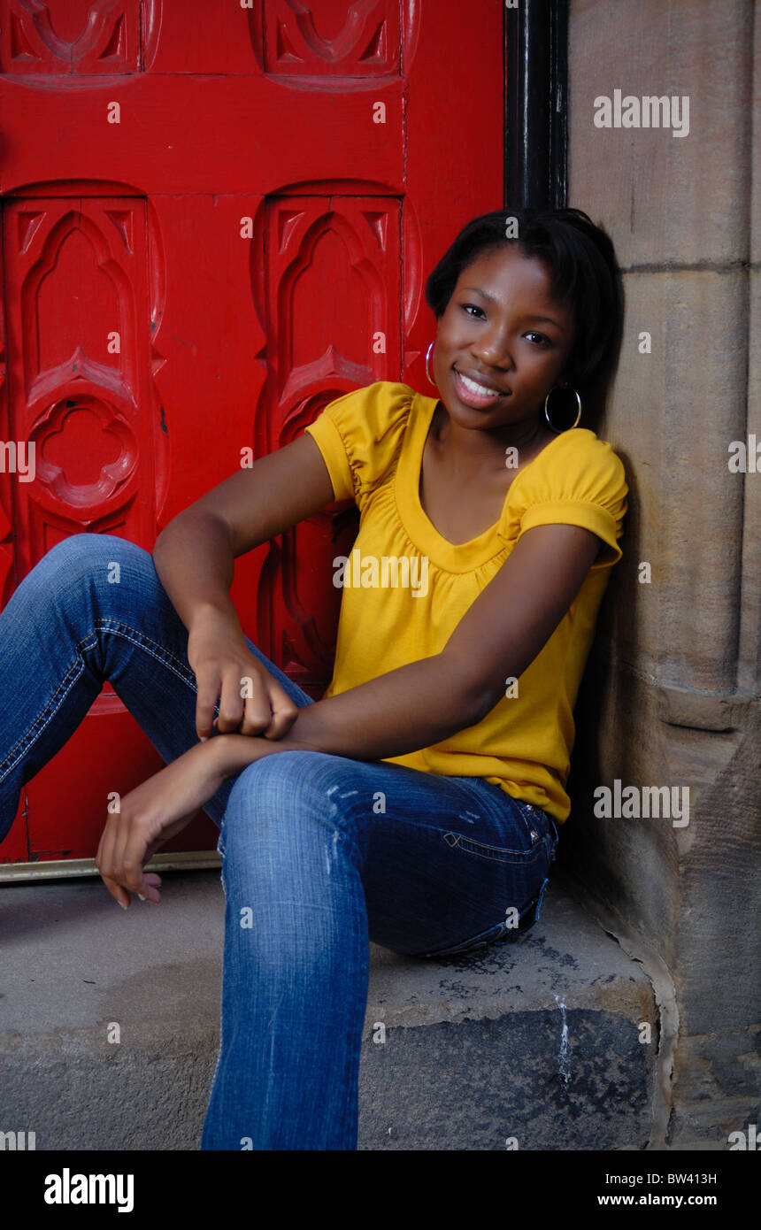 Portrait of a black African American young woman, a high school student ...