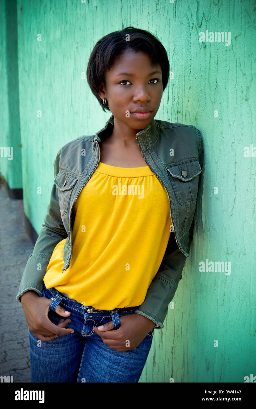 Portrait of a black African American young woman, a high school student ...