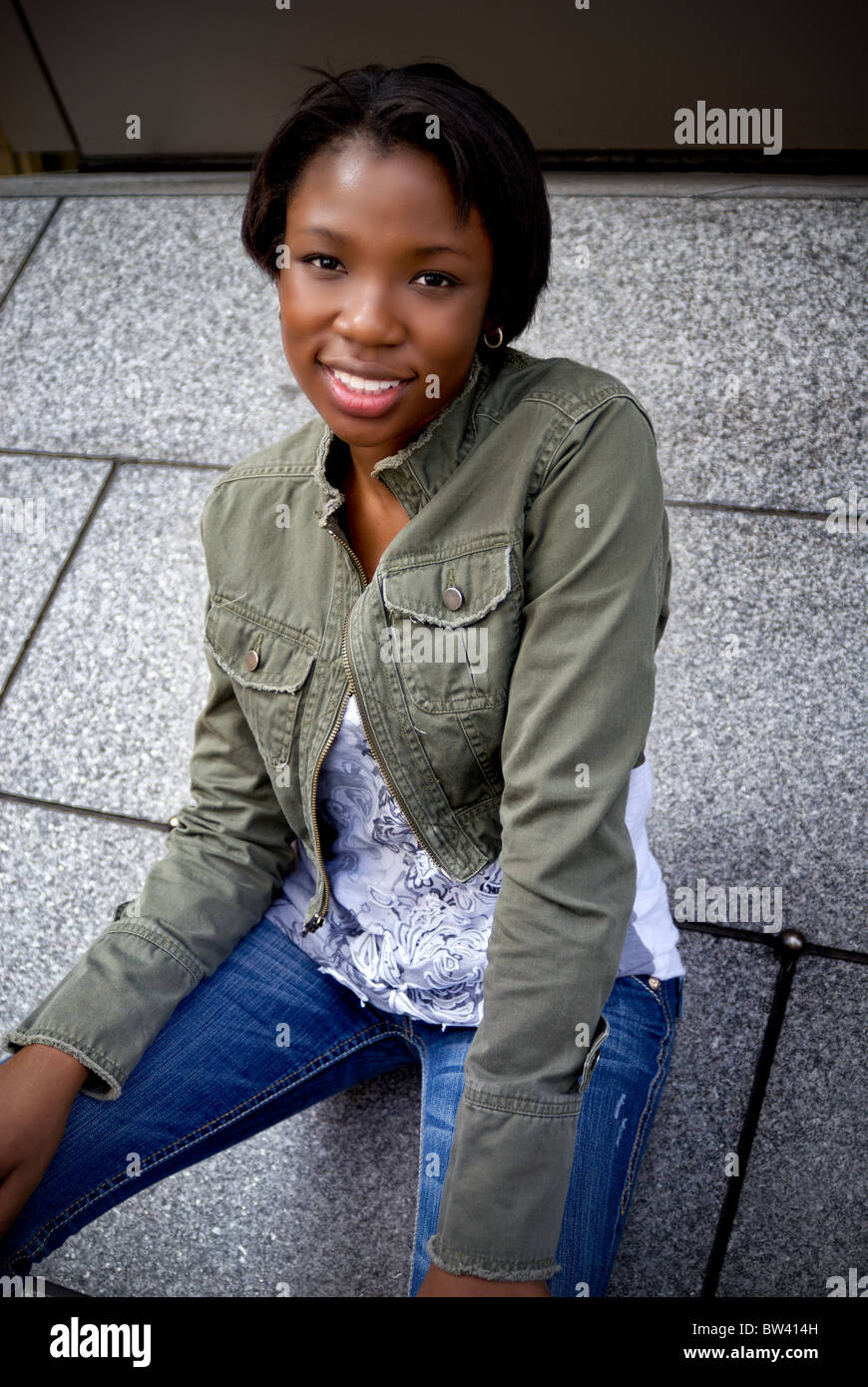 Portrait of a black African American young woman, a high school student ...