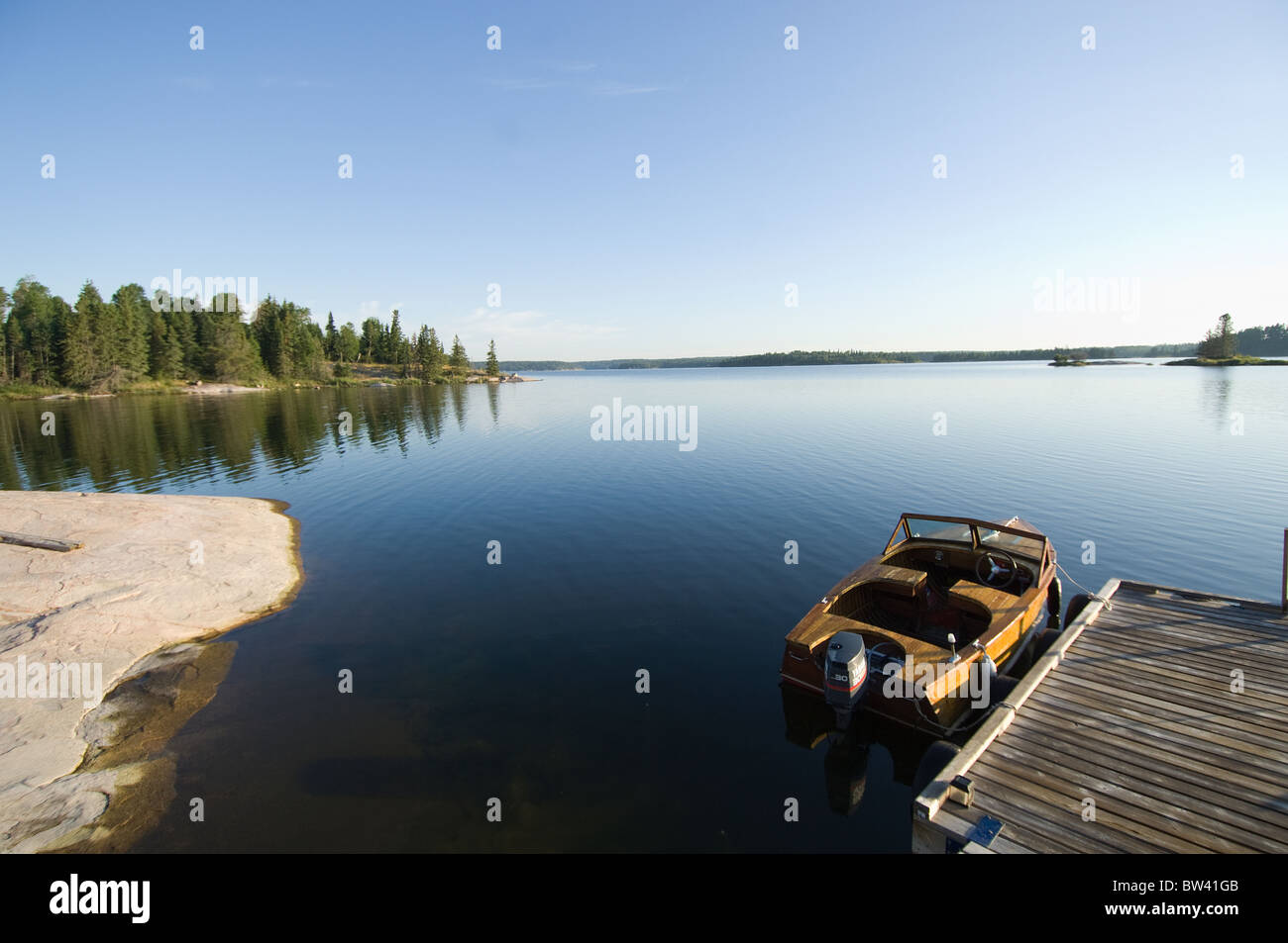 Mahogany motor boat on Gunn Lake, Ontario, Canada Stock Photo Alamy