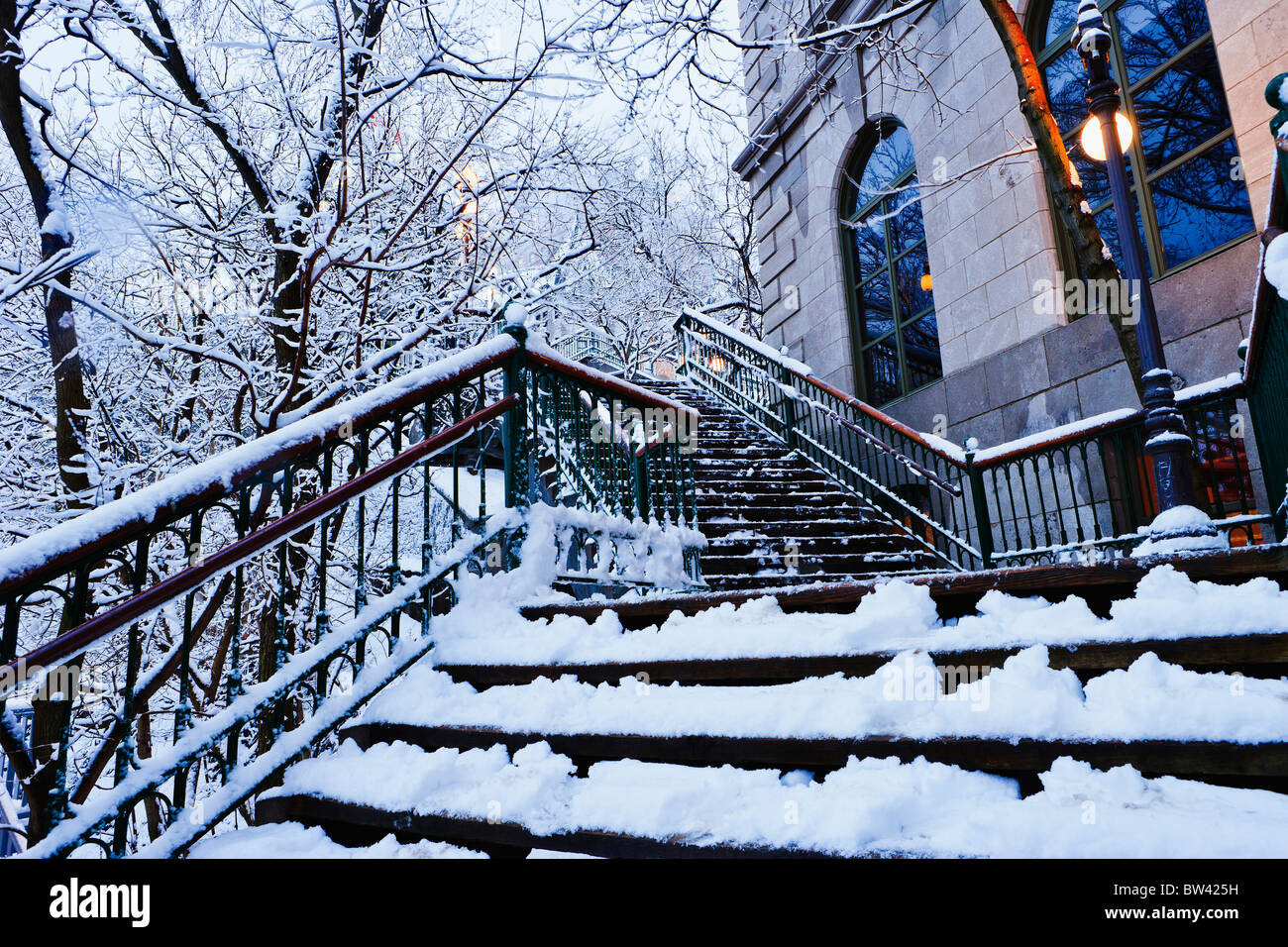 Chateau Frontenac snow-covered stairway at dawn, Quebec City, Quebec Stock Photo