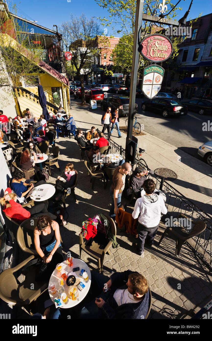 People on terrace, Saint-Denis street, Quartier Latin, Montreal, Quebec. Stock Photo