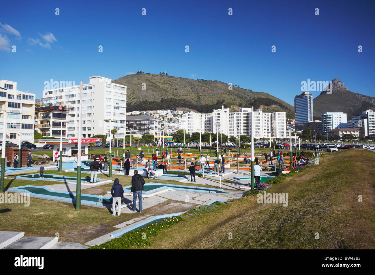 People playing miniature golf, Green Point, Cape Town, Western Cape, South Africa Stock Photo