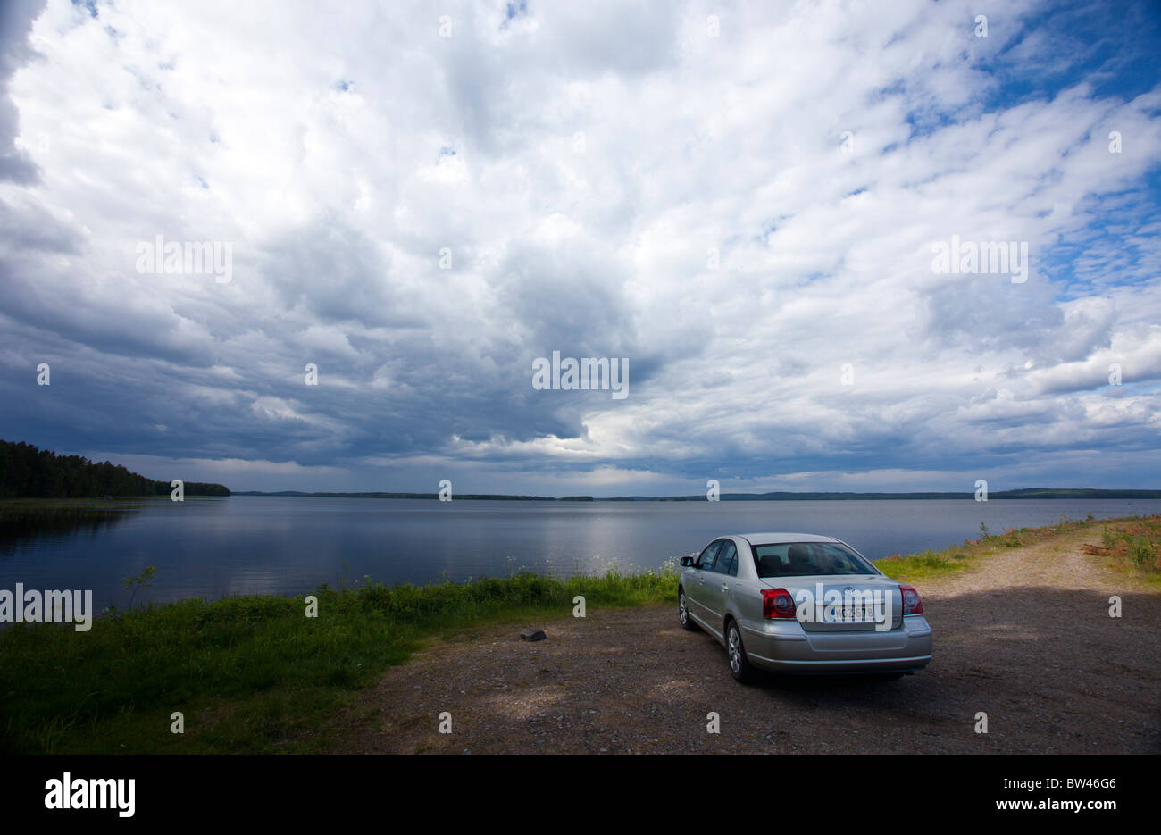 Toyota Avensis 2007 2.2 D4D diesel model parked at lake shore , Finland Stock Photo