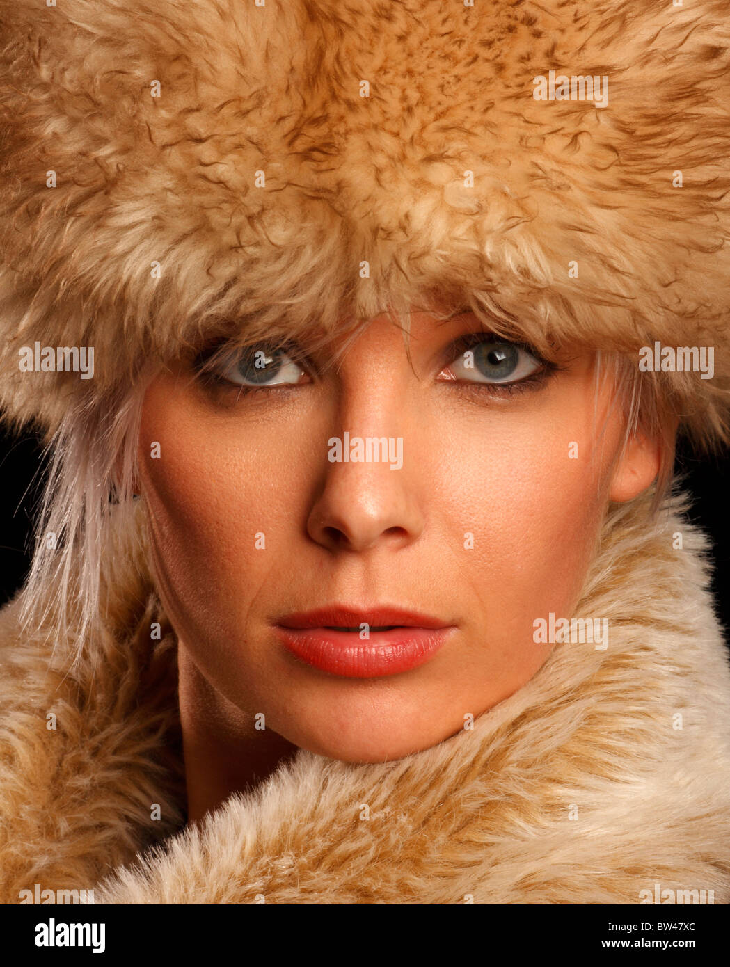 Young woman in a faux fur hat and ruff collar Stock Photo