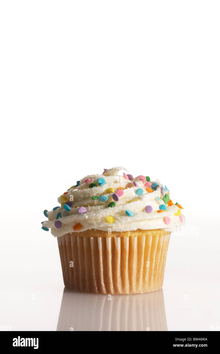 A cupcake with decorated white frosting. Stock Photo