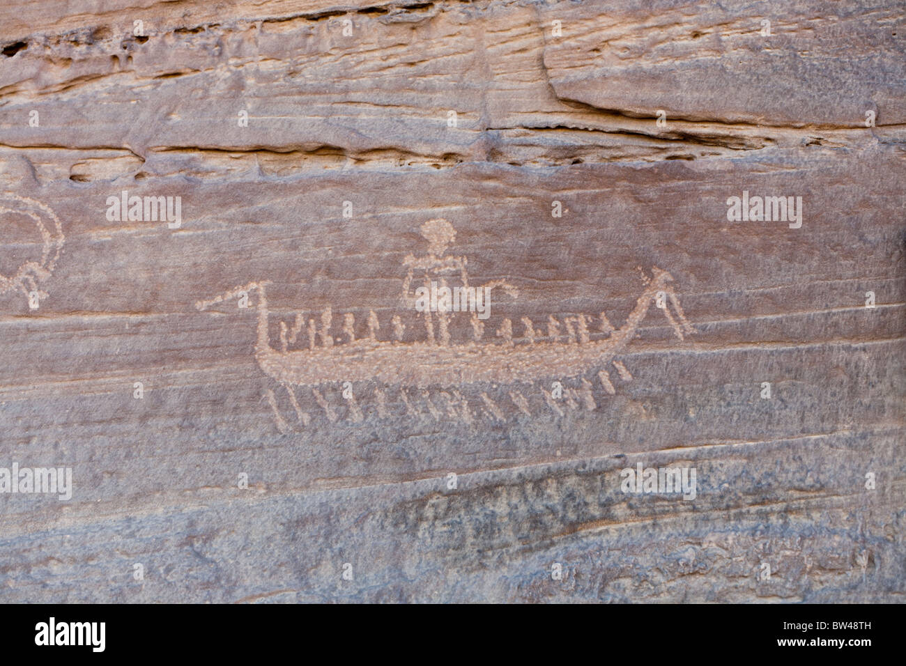 Petroglyph of high prowed boat with crew and chief in the Wadi Umm Salam in Egypt's Eastern Desert Stock Photo