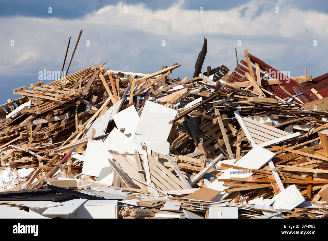 Old used construction / demolition wooden materials piled up and waiting for recycling , Finland Stock Photo