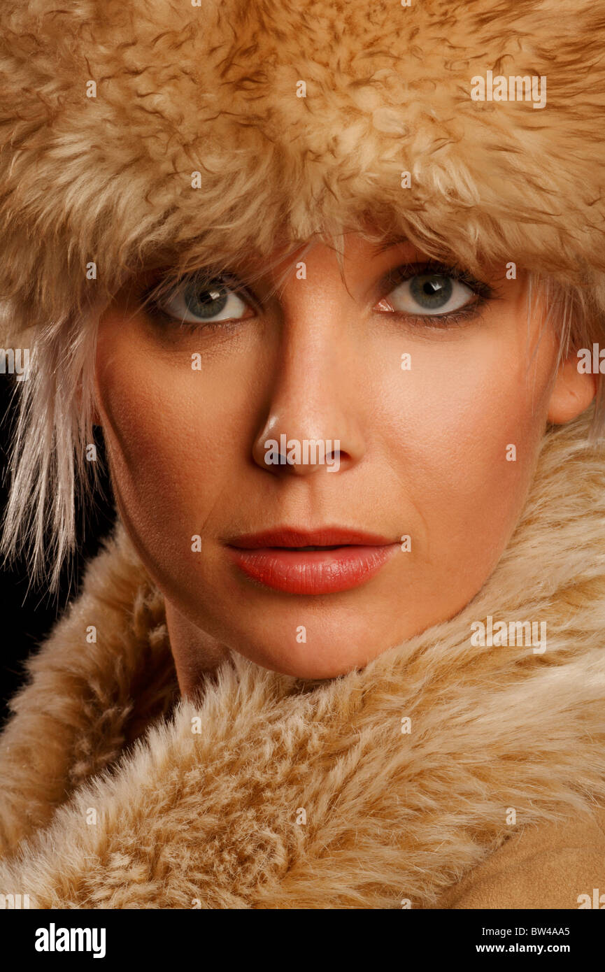 Young woman in a faux fur hat and ruff collar Stock Photo