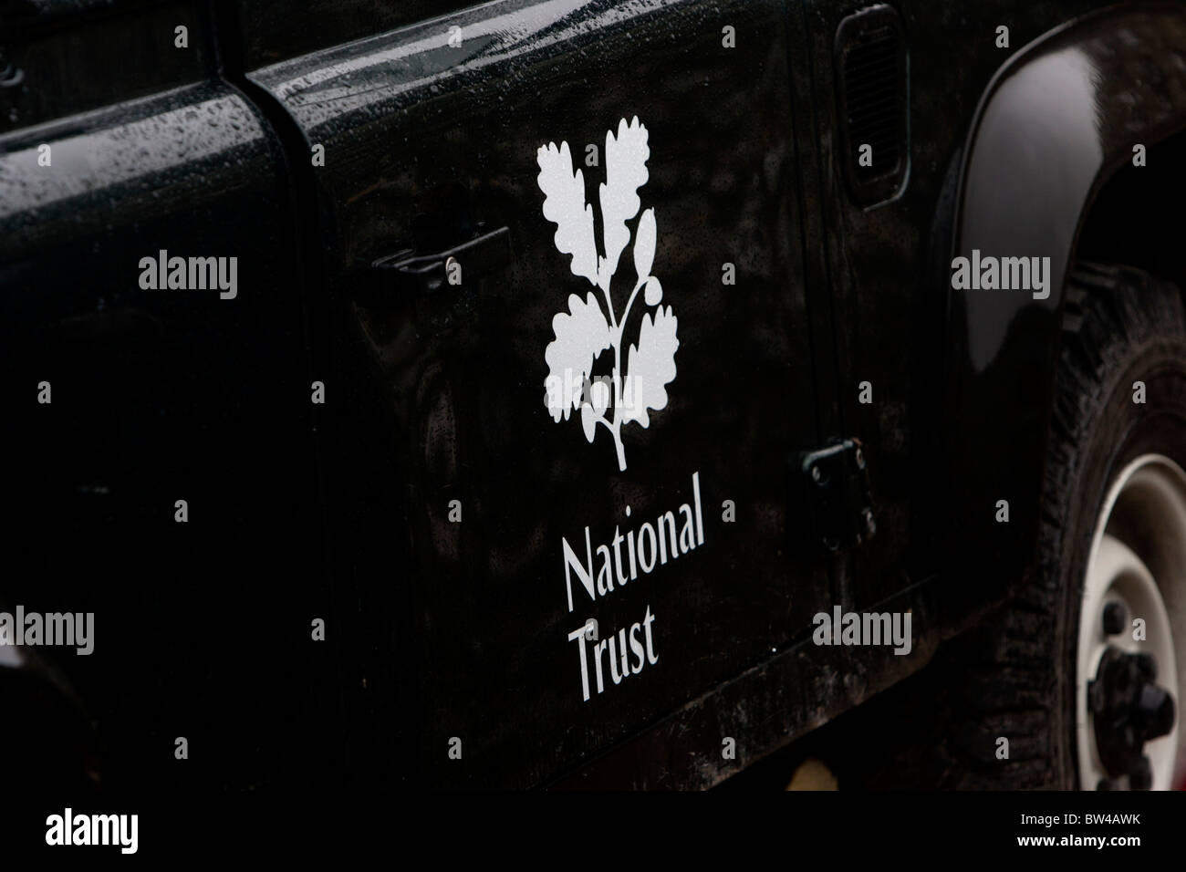 National Trust logo on the side of a Land Rover, East Sussex, UK. Stock Photo