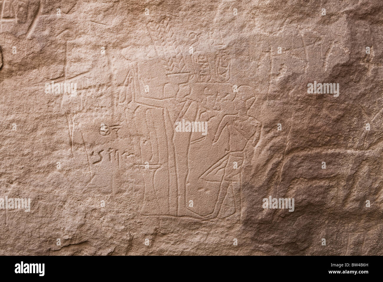 Depiction of Amenhotep before Min  etched in rock-face  in Wadi Mineh in Eastern Desert of Egypt Stock Photo