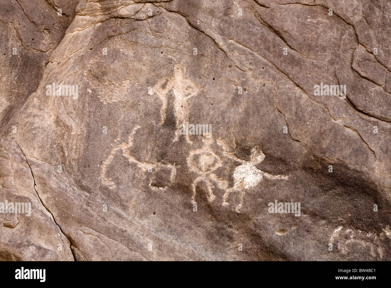 depictions of men and animals on rock in Eastern Desert of Egypt Stock Photo