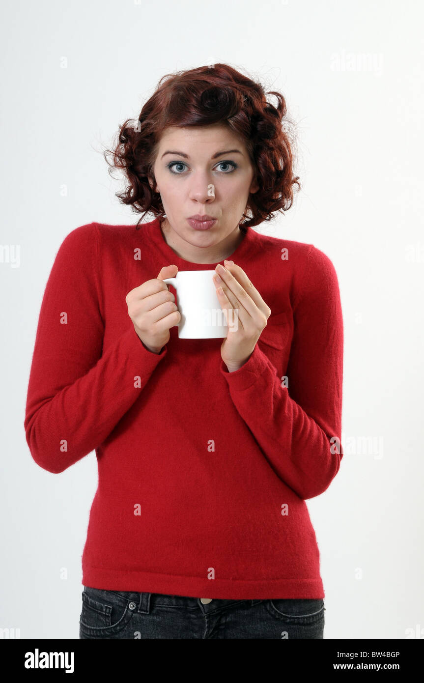 Woman holding a mug Stock Photo