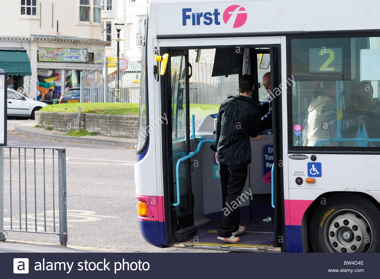 View Of The Open Doors Of A First Bus Service At Weymouth In