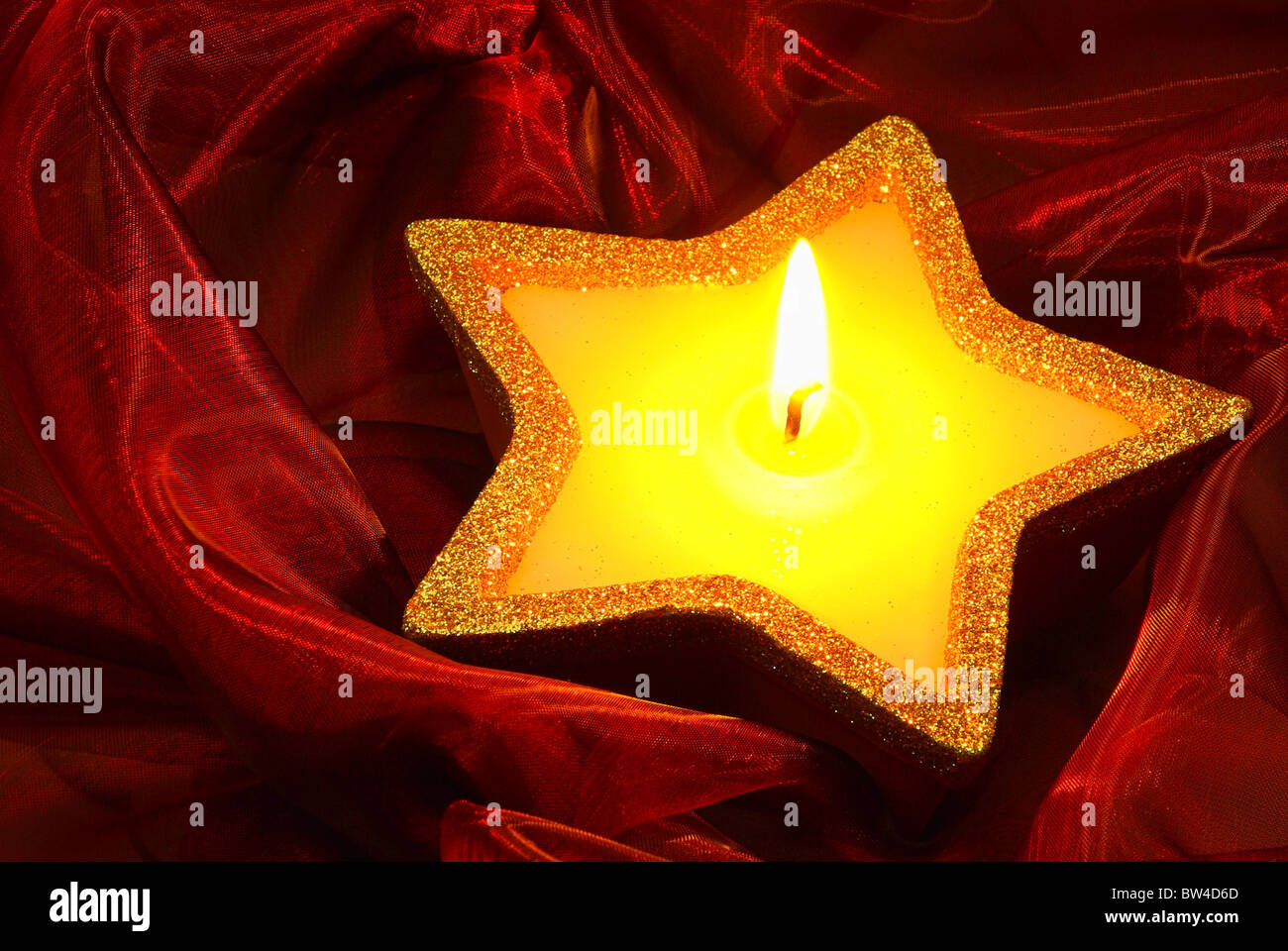 Kerze auf rot - candle on red 13 Stock Photo