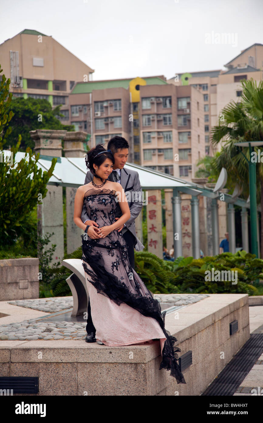 Young Chinese couple posing on their wedding day in Stanley, Hong Kong ...