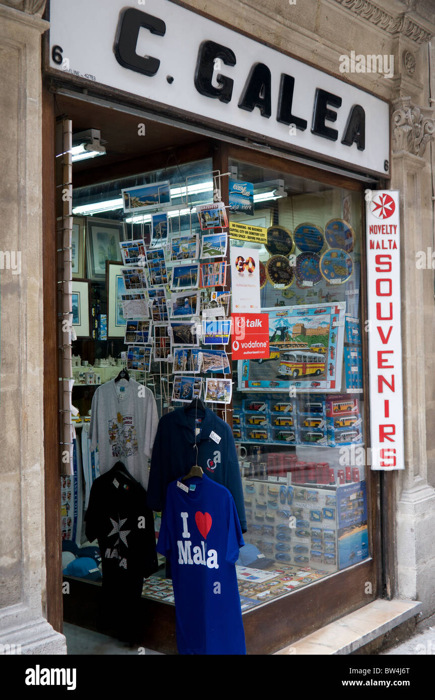 A typical tourist souvenier shop in Valletta, Malta. This one sells a selection of T-shirts, postcards, and pottery Stock Photo