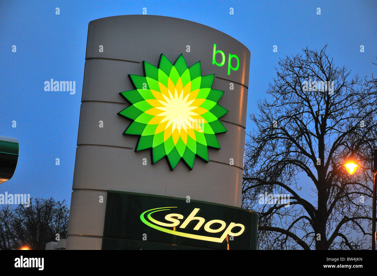 BP garage sign at night Stock Photo