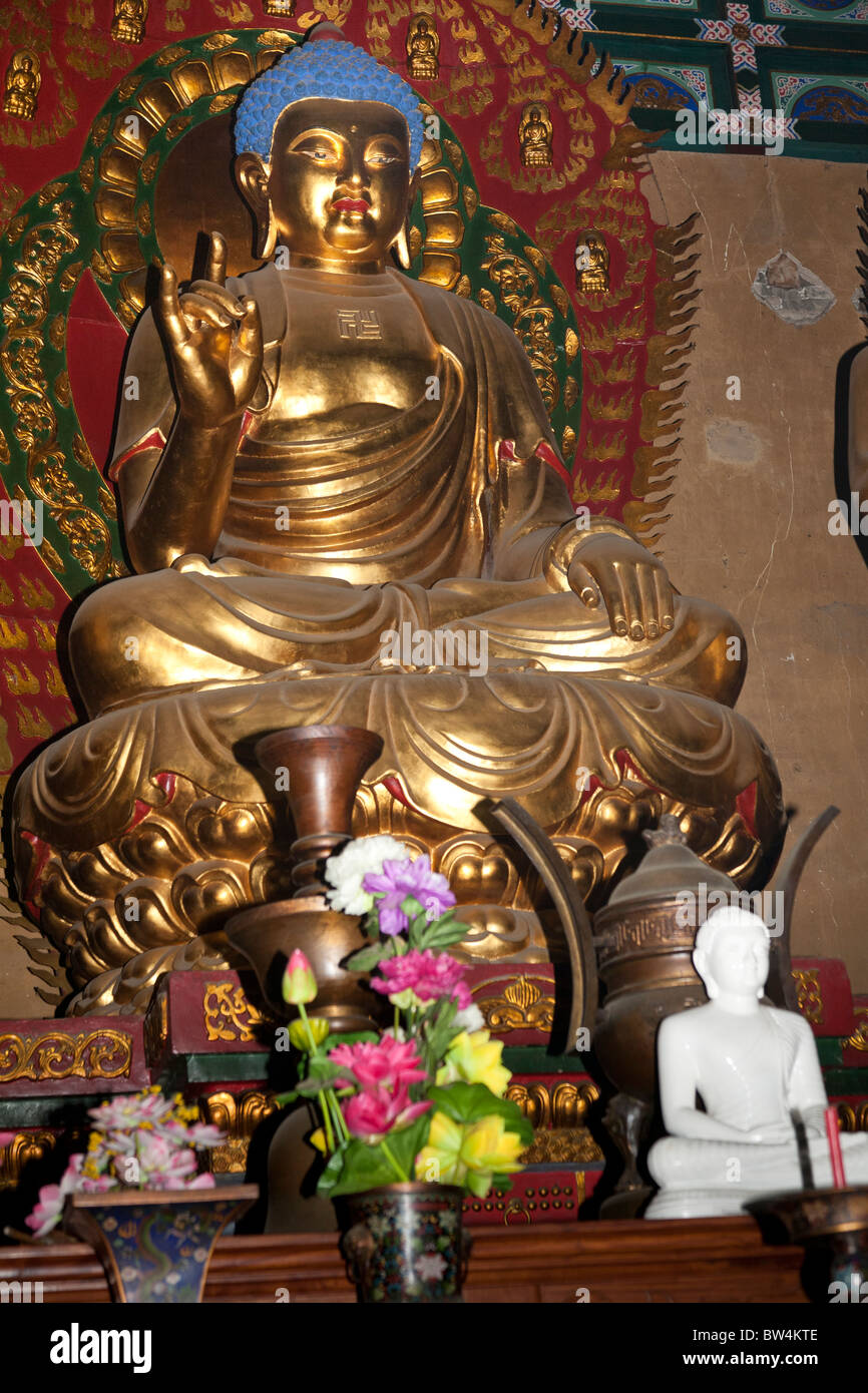 A golden Buddha, Shaolin Temple, birthplace of Kung Fu, Song Shan, near ...
