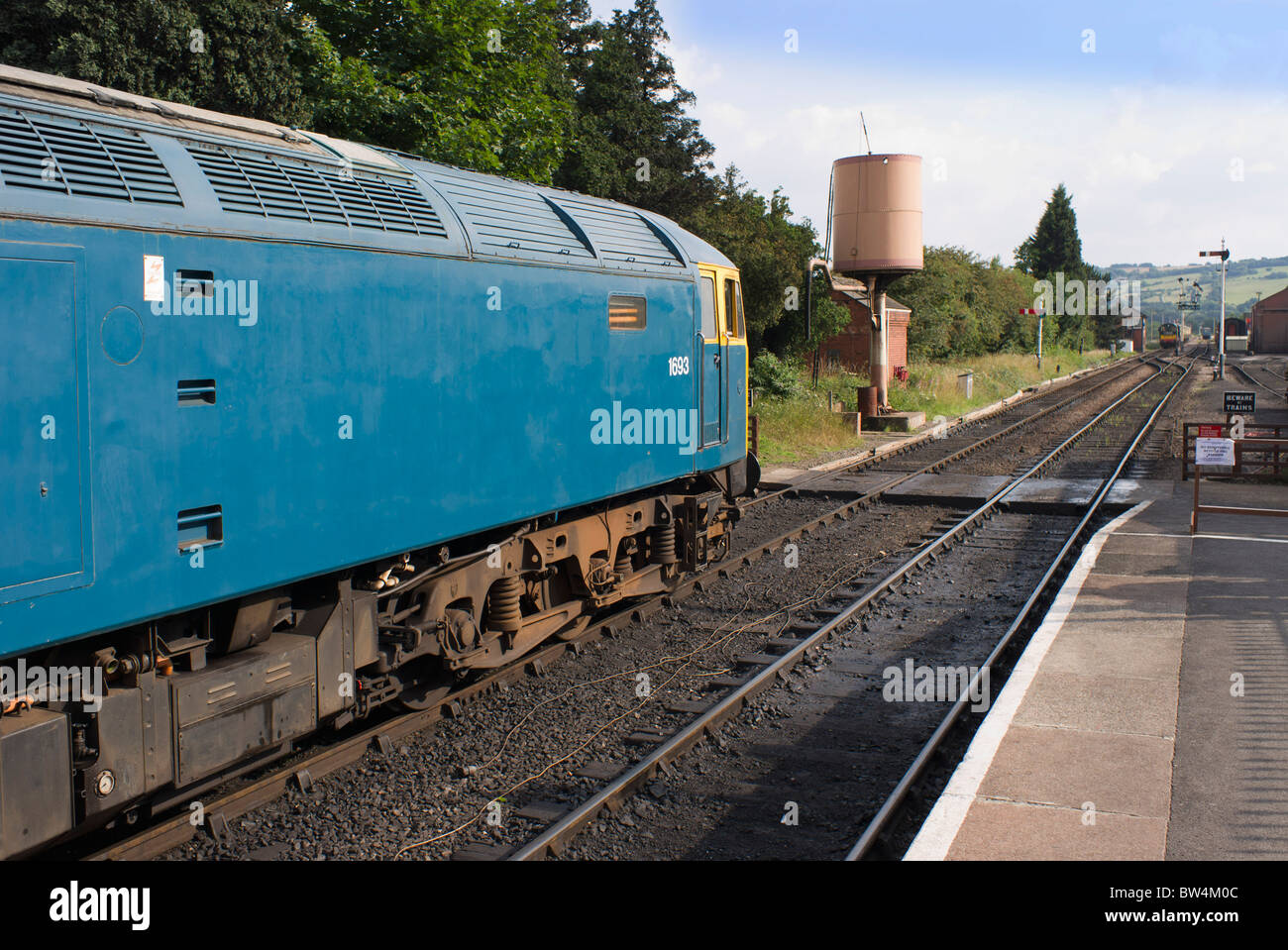 A station on a railway line in the countryside Stock Photo