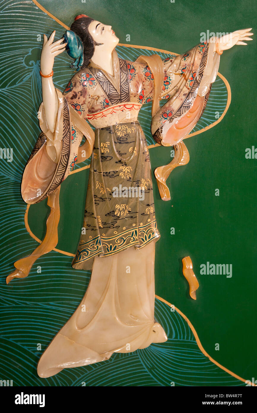 Painted jade carving of a Chinese woman, on a piece of furniture, Beijing, China Stock Photo