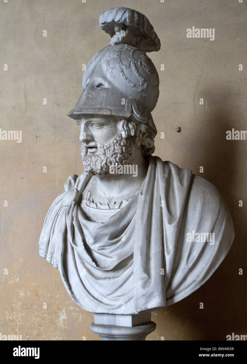 Ancient Roman head of a God, incorporated into a bust of Pyrrhus in the 16th century, on display at the Pitti Palace, Florence Stock Photo