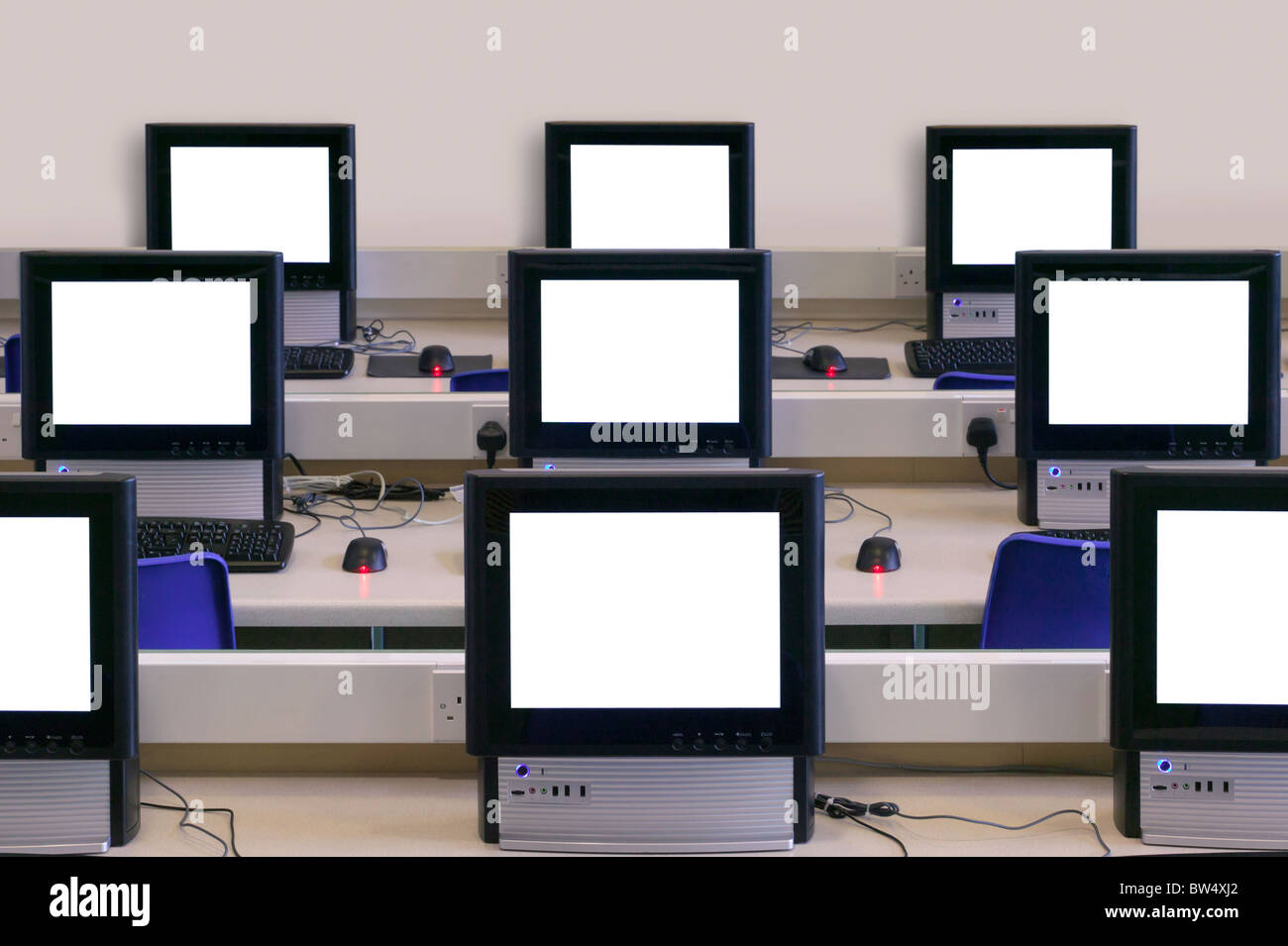 IT classroom with multiple blank computer screens to add your own