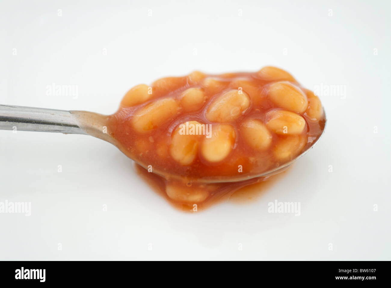 Baked Beans on a Spoon Stock Photo