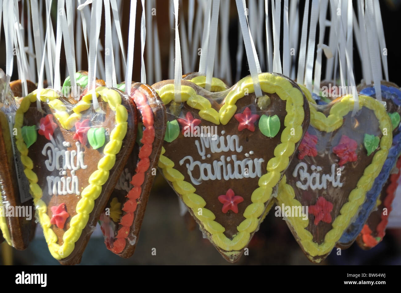 Chocolate and gingerbread hearts hung on ribbons taken at wine festival in Bad Durkheim, Germany Stock Photo