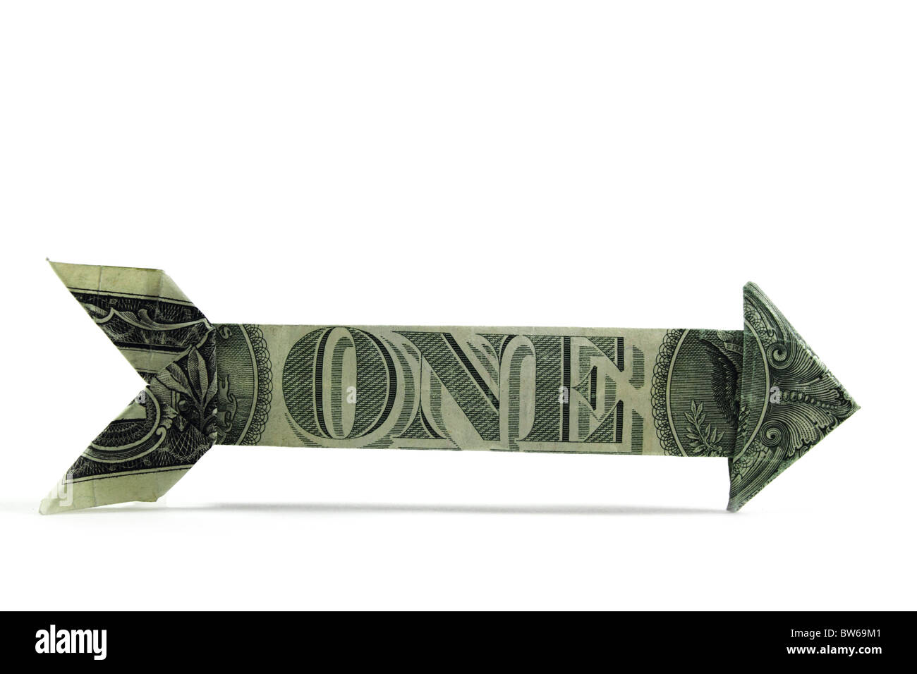 arrow made of USD currency. Shows direction concept, one way, isolated on white Stock Photo