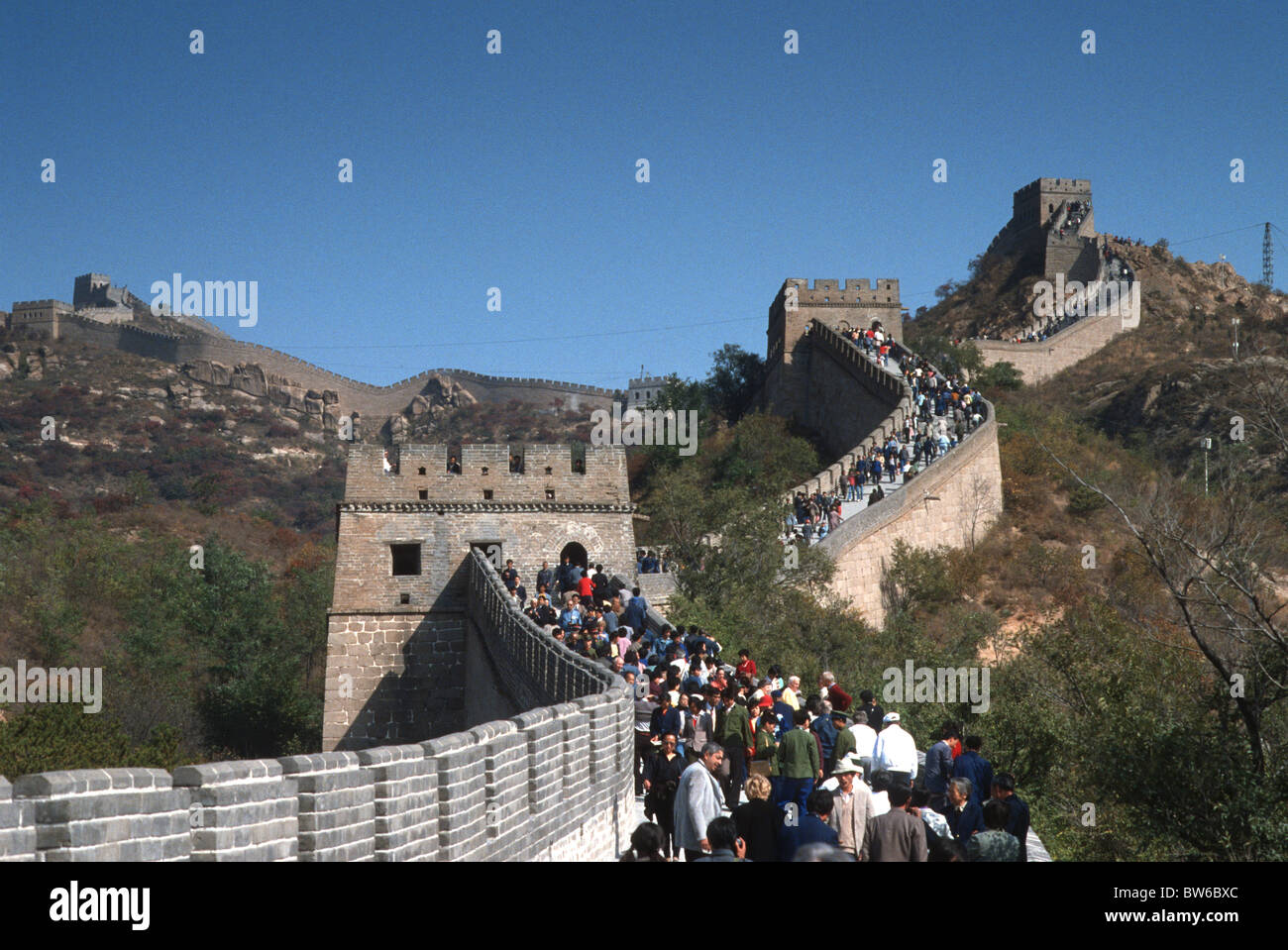 Tourists climb the Great Wall of China at Badaling, China. Stock Photo