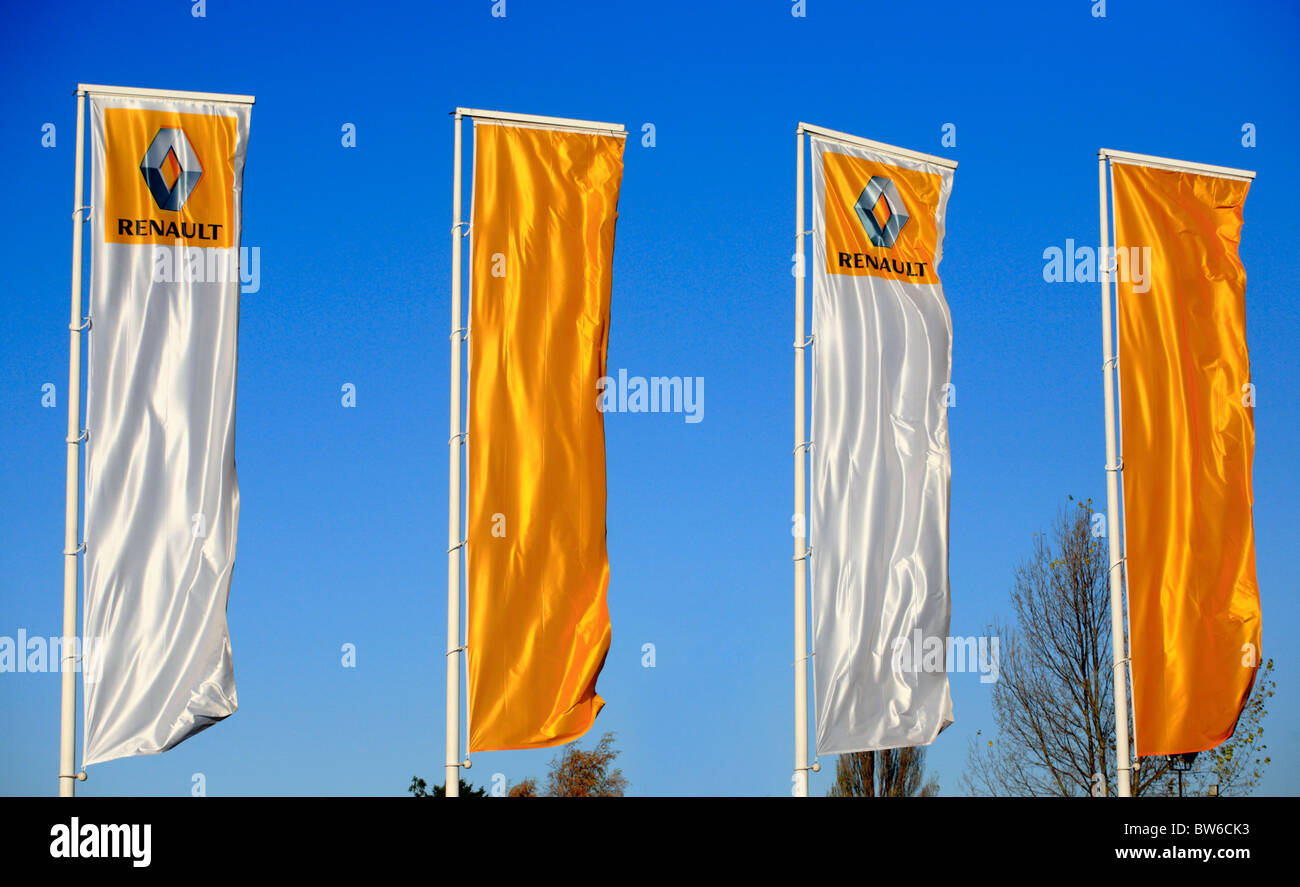 Renault flags flying outside a car showroom in King's Lynn, UK. Stock Photo