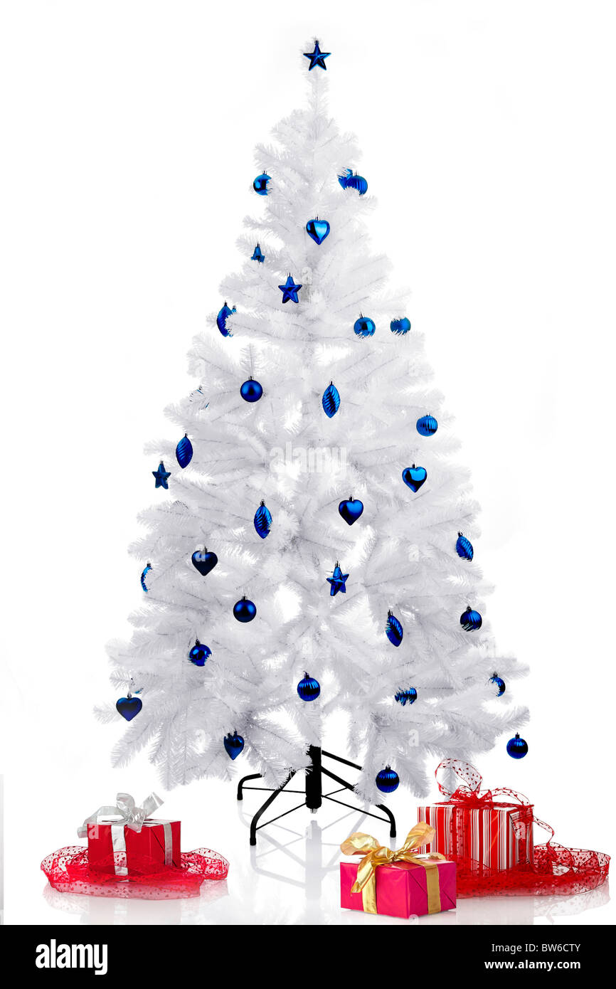 Christmas white tree and gifts over a white background Stock Photo - Alamy