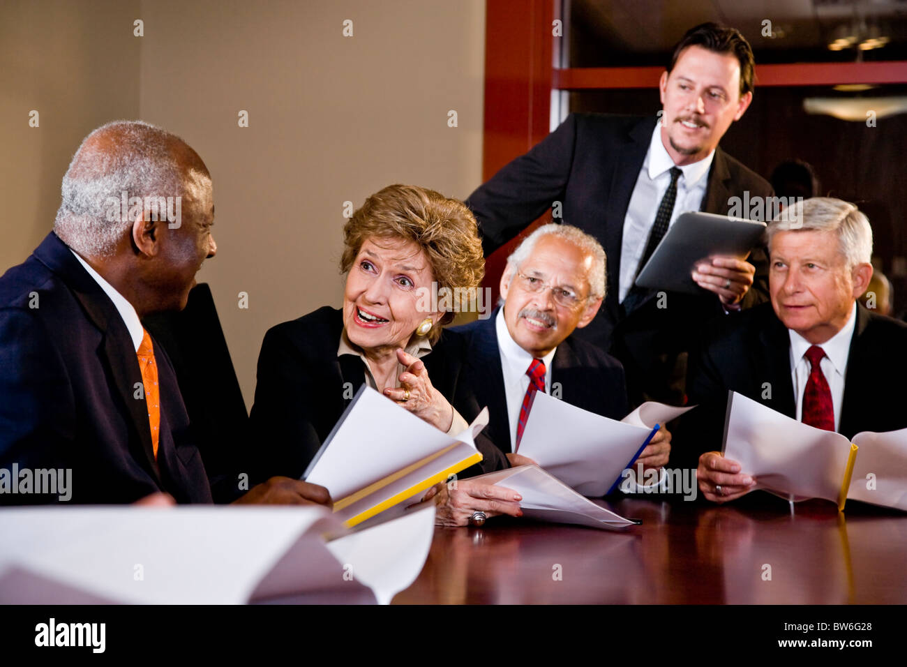 Manager presenting to senior executives in boardroom Stock Photo Alamy Manager presenting to senior executives in boardroom Stock Photo Alamy
